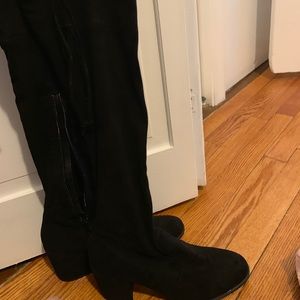 Thigh high heeled boots